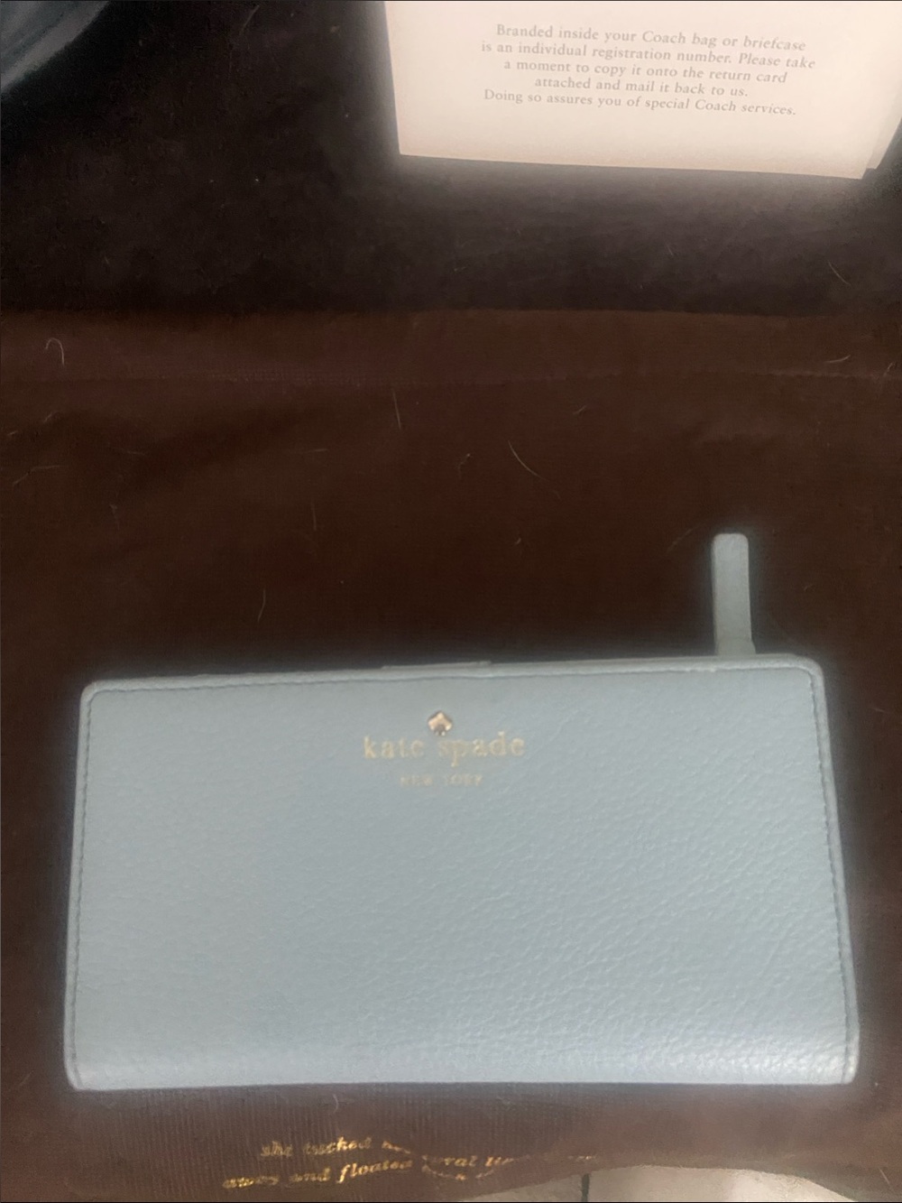 kate spade light blue zip-around leather wallet with gold logo